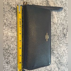 Black coach wrist clutch